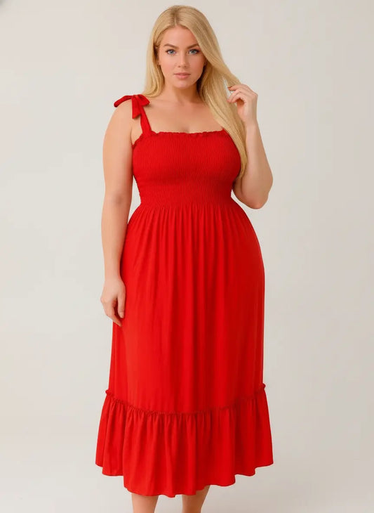 Red Vaura sleep shirt displayed on plain background, showcasing its soft fabric and relaxed fit for comfortable nighttime wear.
