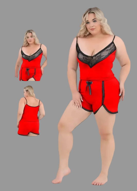 Plus size red pajama set with black lace trim, includes shorts and top, by Vaura, featuring comfortable sleepwear for women.